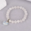 Detailed view of 8mm white crystal beaded bracelet with heart opal stone pendant - White Jade (BNS-0390)