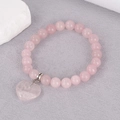 Detail of 8mm rose quartz beaded bracelet featuring a heart-shaped gemstone pendant - Rose Quartz (BNS-0390)