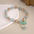 Sparkling crystal butterfly bracelet with blue and champagne beads in gold finish - 6.5cm Diameter / Blue Butterfly Bracelet Style 1