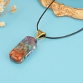 Orgone energy necklace featuring colorful natural stones and copper coil in resin - Large Rectangle Gold