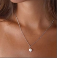Elegant pearl pendant on silver beaded chain necklace worn on model's neck - Single Pearl Silver Handmade Chain (NS-0085)
