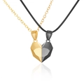 Magnetische Astronauten-Halsketten für Paare in Gold und Schwarz mit Herz-Anhängern - Modell B Herz Halskette Schwarz und Gold (NST-0310)