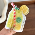 Detail of acrylic hair claw clip with creative summer fruit juice cup design and glitter - Lemon Cup