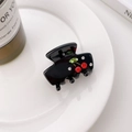 Glossy black acetate hair claw clip with crystal cherry motif on a white plate - 3.5cm / Bright Black