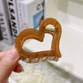 Schicker, transparenter bernsteinfarbener herzförmiger Haarklammer aus Harz mit Goldfeder - Beige Kaffee