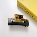 Close-up of square acetate hair claw with dual-tone black and tortoise shell finish - Tortoiseshell Brown-7.5cm