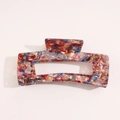 Detail of French vintage acetate claw clip with colorful floral marble texture finish - Floral Red