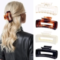 Detail of four large rectangular claw clips in clear, tortoiseshell, cream and black colors - 4-Piece Rectangular Set