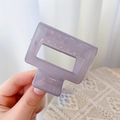 Macro detail of a purple translucent rectangular hair claw clip with metal spring - 5cm / Jelly Grey