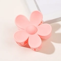 Detailed view of a pink flower hair claw clip with a high-quality matte finish - Pink