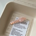 Pink acetate hair clip with cute bunny charm detail in elegant gift box packaging - Pink