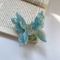 Detailed view of the blue and white butterfly hair claw clip with its golden metal spring - Colorful Cyan (8cmx6.8cm 28g)