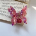 Detail of pink and purple acetate butterfly hair claw with gold spring on a book - Colorful Red (8cmx6.8cm 28g)