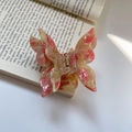 Detail of pink acetate butterfly hair claw with woven texture pattern on a book - Colorful Pink (8cmx6.8cm 28g)