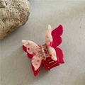 Detailansicht der Haarspange mit rosa Blumenmuster und rotem Schmetterling auf Steingrund - 7*8.5*3.5 / Rosarote Schmetterlinge