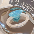 Unique diamond ring shaped hair claw with blue crystal top and ivory white striped base - Large