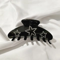 Glossy black hair claw clip featuring sparkling rhinestone star patterns on silk fabric - Black