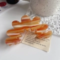 Eleganter großer Haarklammer aus Acetat in Bernstein mit Wellendesign und Marmorierung - Sonnenuntergang Orange / 8.8cm