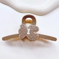Detailed view of a brown bear claw clip featuring a quilted pattern and white bow accent - Bear Hair Claw / 11.2cm / Coffee