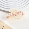 Close-up of cream floral hair claw clip with pink resin flowers and sparkling rhinestones - Mermaid Pearlescent Style