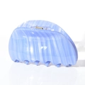 Detail of light blue marble acetate hair claw clip with unique vertical wavy texture - Sky Blue