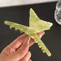 Macro detail of high-quality green marble acetate butterfly hair claw clip for women - Aqua Green