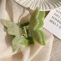 Detail of a light green double-layer butterfly hair claw clip with acetate texture - Green (6.5cm)
