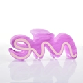 Macro-opname van de paarse acetaat haarklem met golvend ontwerp en roze marmerpatroon - Wit