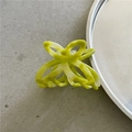 Detailed top view of the neon green and white marble acetate hair claw clip - Mustard Green