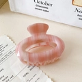 Detailed close-up of pink marble acetate hair claw clip with gold handmade inscription - Large / Pink & White