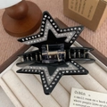Macro detail of star-shaped hair claw clip with black acetate and sparkling crystals - Black Star (A3-4-19) / 9.2cm