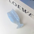 Macro shot of light blue acetate wine glass hair claw clip with silver glitter and marble texture - Light Blue