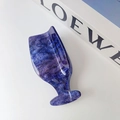 Detail of a purple and blue marbled acetate hair claw clip with golden glitter - Deep purple