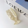 Close-up of elegant wine glass shaped hair claw clip in shimmering pearl white acetate - Champagne