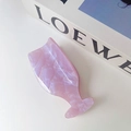 Close-up of pink marble acetate hair claw clip with sparkling glitter texture detail - Light Purple
