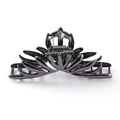 Detail of gunmetal irregular metallic claw clip showing tiered petal design and sturdy spring - Gunmetal / 11.5cm