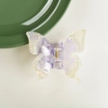 Detailed macro view of butterfly hair claw with violet marble pattern and rhinestones - Colorful Purple (8cm)