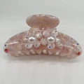 Macro shot of large pink marble hair claw with rhinestone flowers and white pearls - Two Small Flowers Artificial Pearl Version