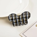 Dettaglio della pinza per capelli a scacchi a forma di Mickey con molla dorata su base chiara - Nero / 7.5cm