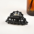 Detailed view of black spider web hair claw clip with golden metal spring mechanism - Large Hollow Style (Approx. 9cm) / Black