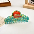 Dettaglio molletta per capelli in acetato con motivo marmorizzato e decoro anguria in strass - Clip Anguria Marmo Blu Verde