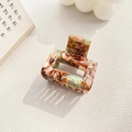 Detail view of square marble texture acetate hair claw clip with vintage amber pattern - 3.5cm / Floral Light Brown