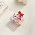 Macro detail of rectangle colorful acetate hair claw with vintage terrazzo pattern - Small / Colorful