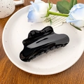 Polished black acetate hair claw clip with wavy edges for elegant updo hairstyles - 10.5cm / Glossy Black