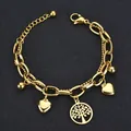 Bracciale multistrato in acciaio al titanio dorato con pendenti cuore e albero della vita - Oro