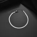 Macro shot of silver stainless steel flat snake chain bracelet with lobster clasp - 3mm Width / Steel