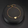 Elegant gold titanium steel heart bracelet with adjustable sliding clasp for women - Gold