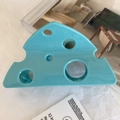 Detail of creative blue Swiss cheese hair claw clip with triangular hollow pattern - 9.4cm / Blue