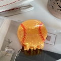 Detailed view of yellow baseball hair claw clip with realistic red stitching patterns - Yellow Baseball