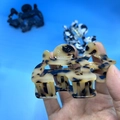 Set of 3 hollow dog-shaped acetate hair claws in leopard, black, and cow print patterns - Hair Claw / Light Tortoiseshell